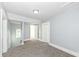 A bedroom with ample natural light and plush carpeting offers a warm and inviting atmosphere for rest and relaxation at 821 S Lebanon St, Lebanon, IN 46052