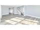 Inviting living room with staircase, fresh paint, modern flooring, and ample space for furnishings at 821 S Lebanon St, Lebanon, IN 46052