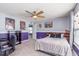 Bedroom with a desk and bed with a view of a closet at 8335 S Shady Trail Dr, Pendleton, IN 46064