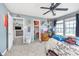 Cozy bedroom with a view to a closet, equipped with desk and collectibles at 8335 S Shady Trail Dr, Pendleton, IN 46064