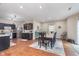 Open dining area features modern lighting, stylish rug, and dark wood accents at 8335 S Shady Trail Dr, Pendleton, IN 46064