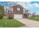 Attractive two-story home with brick accents, a front porch, and a well-maintained lawn at 8335 S Shady Trail Dr, Pendleton, IN 46064