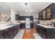 Updated kitchen with stainless steel appliances and wine rack at 8335 S Shady Trail Dr, Pendleton, IN 46064
