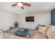 Comfortable living room with TV, a sectional sofa, and a modern beverage center at 8335 S Shady Trail Dr, Pendleton, IN 46064