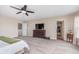 Carpeted primary bedroom with en-suite access and ample natural light at 8335 S Shady Trail Dr, Pendleton, IN 46064