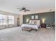 Spacious primary bedroom featuring a ceiling fan and cozy decor at 8335 S Shady Trail Dr, Pendleton, IN 46064