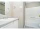 Bathroom featuring vanity, sink, mirror, and shower over tub at 9049 Southernwood Way, Indianapolis, IN 46231