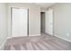 Carpeted bedroom featuring double closet at 9049 Southernwood Way, Indianapolis, IN 46231