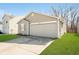 Charming single-story home featuring a one car garage, lawn, and neutral siding at 9049 Southernwood Way, Indianapolis, IN 46231