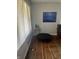 A cozy living room featuring hardwood floors and a minimalist aesthetic with modern art at 960 W 52Nd St, Indianapolis, IN 46208