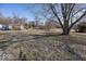 Expansive yard with mature trees offering a sense of tranquility and privacy at 960 W 52Nd St, Indianapolis, IN 46208