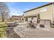 Backyard deck features a fire pit, built-in seating, and a pergola-covered dining area at 10111 Ironway Dr, Indianapolis, IN 46239