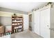 Inviting bedroom with storage and a view into a hallway at 10111 Ironway Dr, Indianapolis, IN 46239
