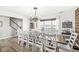 Spacious dining room with a large table, natural light, and modern decor at 10111 Ironway Dr, Indianapolis, IN 46239