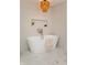 Bathroom featuring a soaking tub with gold fixtures at 1026 Jefferson Ave, Indianapolis, IN 46201