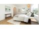 Cozy bedroom with large window and hardwood flooring at 1026 Jefferson Ave, Indianapolis, IN 46201