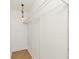 Walk-in closet with a hanging light and metal shelving at 1026 Jefferson Ave, Indianapolis, IN 46201