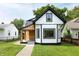 Charming two-story home featuring a modern exterior design and a well-manicured lawn at 1026 Jefferson Ave, Indianapolis, IN 46201