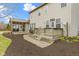 The home has a large backyard deck and screened in porch with a lush lawn and mature trees at 10451 Meadow Lake Dr, Fishers, IN 46038