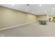 Spacious finished basement with carpet flooring and recessed lighting, perfect for entertaining at 10451 Meadow Lake Dr, Fishers, IN 46038