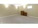 Empty basement room with carpet flooring and storage furniture, providing ample storage space at 10451 Meadow Lake Dr, Fishers, IN 46038