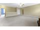 Expansive bonus room with neutral walls, a ceiling fan, and a versatile layout, ideal for various activities at 10451 Meadow Lake Dr, Fishers, IN 46038