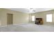 Spacious bonus room featuring neutral walls, large windows, and a ceiling fan, perfect for versatile use at 10451 Meadow Lake Dr, Fishers, IN 46038