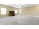 Large bonus room offering ample space, neutral walls, and a ceiling fan, ready for personalized design at 10451 Meadow Lake Dr, Fishers, IN 46038