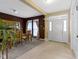 Welcoming entryway with a combination of carpet and tile flooring, dining area, and natural light from windows at 10451 Meadow Lake Dr, Fishers, IN 46038
