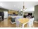 Spacious eat-in kitchen with ample cabinet storage, tile backsplash, and stainless steel appliances at 10451 Meadow Lake Dr, Fishers, IN 46038