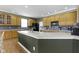 Bright eat-in kitchen features sleek countertops, stainless steel appliances, and an island perfect for entertaining at 10451 Meadow Lake Dr, Fishers, IN 46038