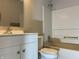 Bathroom featuring a tub/shower combination, white vanity, and toilet at 10622 Howe Rd, Fishers, IN 46038