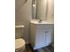 Bathroom featuring a modern vanity with white cabinetry at 10622 Howe Rd, Fishers, IN 46038