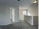 Second story hallway featuring a window, neutral paint, and carpet at 10622 Howe Rd, Fishers, IN 46038