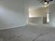 Second story hallway featuring gray carpet and neutral paint at 10622 Howe Rd, Fishers, IN 46038