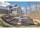 Outdoor fire pit with stepping stones, perfect for entertaining in the backyard of this beautiful home at 10756 Dartmoor Way, Zionsville, IN 46077