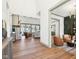 View of the open floor plan highlighting the living room and sitting room at 10756 Dartmoor Way, Zionsville, IN 46077