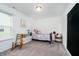 Bright bedroom with a playful decor, featuring a cute bed and chalkboard wall at 1142 Cobra Dr, Franklin, IN 46131