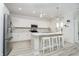 Modern kitchen featuring an island, stainless steel appliances, and white cabinetry, perfect for culinary enthusiasts at 1142 Cobra Dr, Franklin, IN 46131