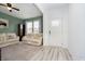 Cozy living room features neutral colors, comfortable seating, and carpeted floors at 1142 Cobra Dr, Franklin, IN 46131