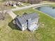 Two-story home with spacious backyard, deck, and air conditioning system at 12121 N Berling Dr, Mooresville, IN 46158