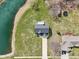 Areal view of two-story house with large manicured lawn and backyard deck at 12121 N Berling Dr, Mooresville, IN 46158