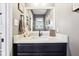Modern bathroom with a stylish vanity and white marble countertop, plus decorative elements at 12121 N Berling Dr, Mooresville, IN 46158