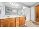 Bathroom with double vanity, tile floors, and access to a walk in shower at 12121 N Berling Dr, Mooresville, IN 46158