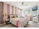 Serene bedroom featuring a wood paneled wall, soft lighting, and a cozy, inviting feel at 12121 N Berling Dr, Mooresville, IN 46158