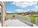 View from the outdoor deck of the home facing a picturesque pond with grassy surroundings at 12121 N Berling Dr, Mooresville, IN 46158