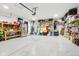 Large garage with plenty of storage and a workspace at 12121 N Berling Dr, Mooresville, IN 46158