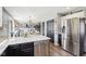 Open-concept kitchen and dining room area with stainless steel appliances and natural light at 12121 N Berling Dr, Mooresville, IN 46158