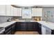 The kitchen features ample counter space, a window, and stainless steel appliances at 12121 N Berling Dr, Mooresville, IN 46158