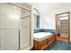 Bright bathroom with a walk-in shower and soaking tub at 12307 Pebblepointe Pass, Carmel, IN 46033